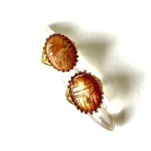 bague medaillon scarabée pierre de soleil